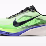 Nike Pegasus 42 in bright neon green with blue accents highlighting the new curved Air Zoom and ReactX foam