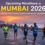 Mumbai marathon runners along Marine Drive during sunrise road race event