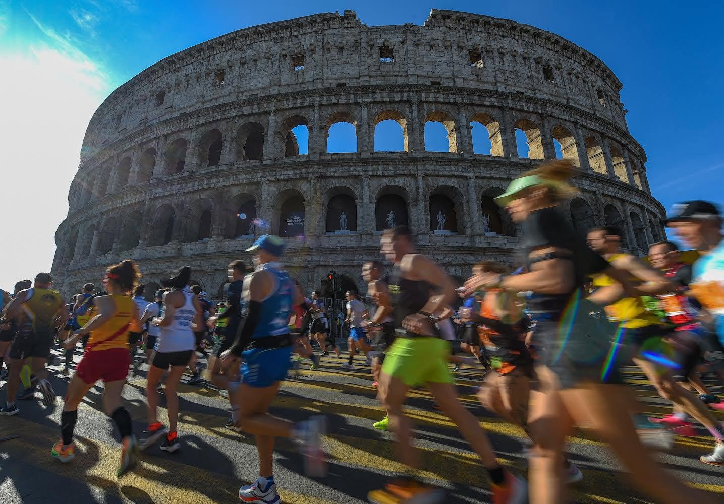 Runners pass the Colosseum during Run Rome the Marathon 2026