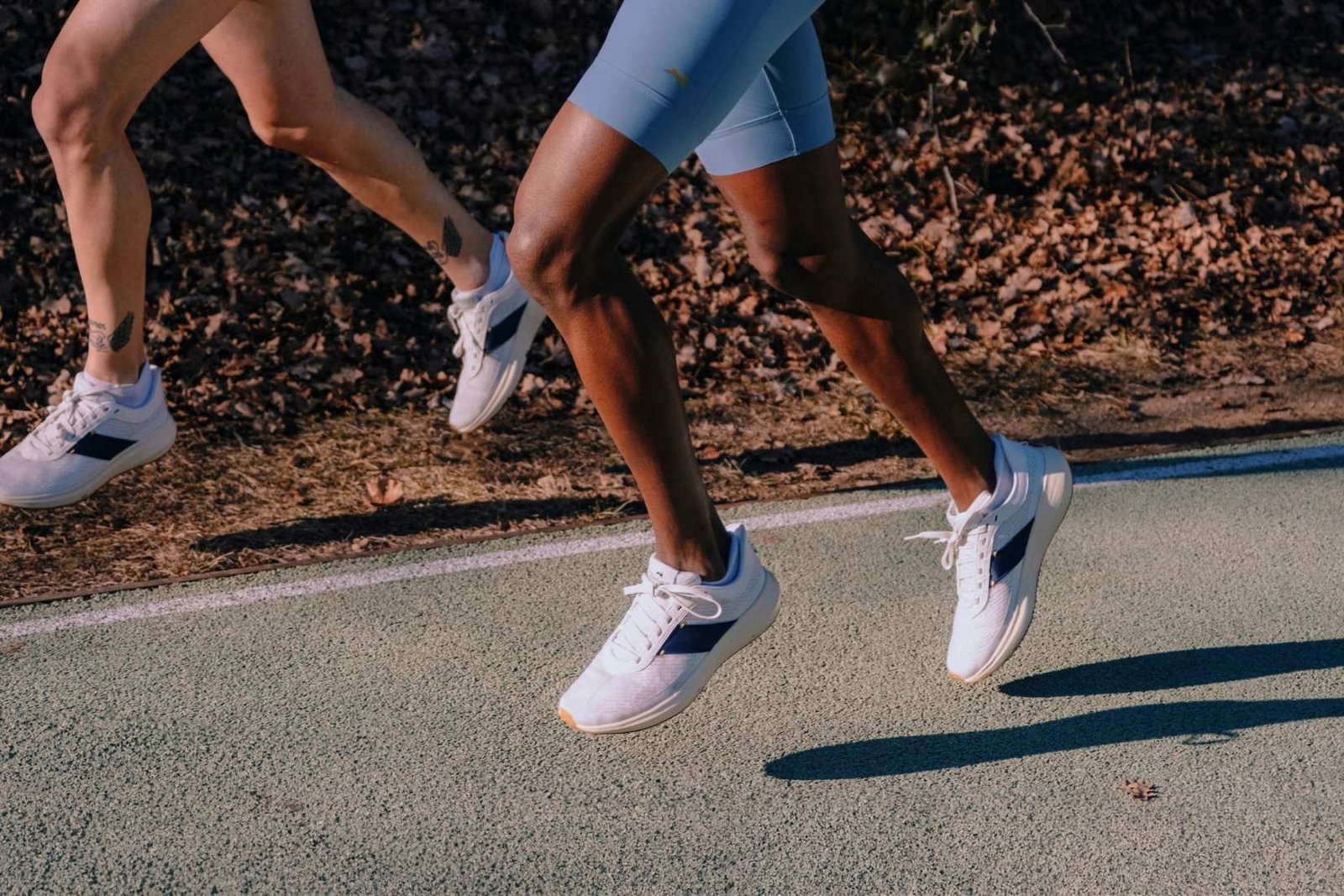 Tracksmith Eliot Ryder Preview: Max Cushion in a Sleek Package at $220 2 Runner wearing Tracksmith Eliot Ryder max cushion running shoes during morning training run