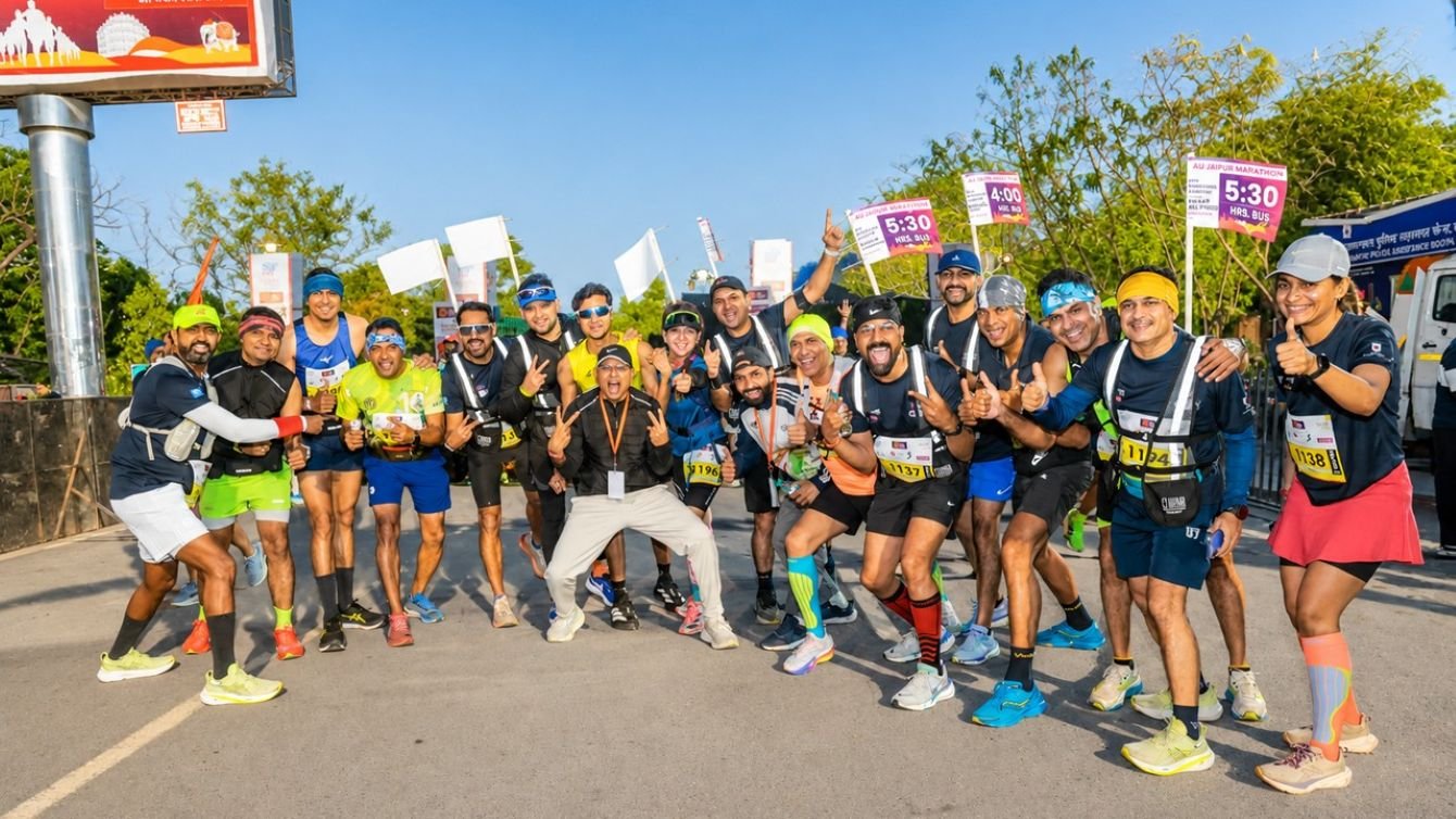 Runners pose at the start of the AU Jaipur Marathon in Jaipur, Rajasthan