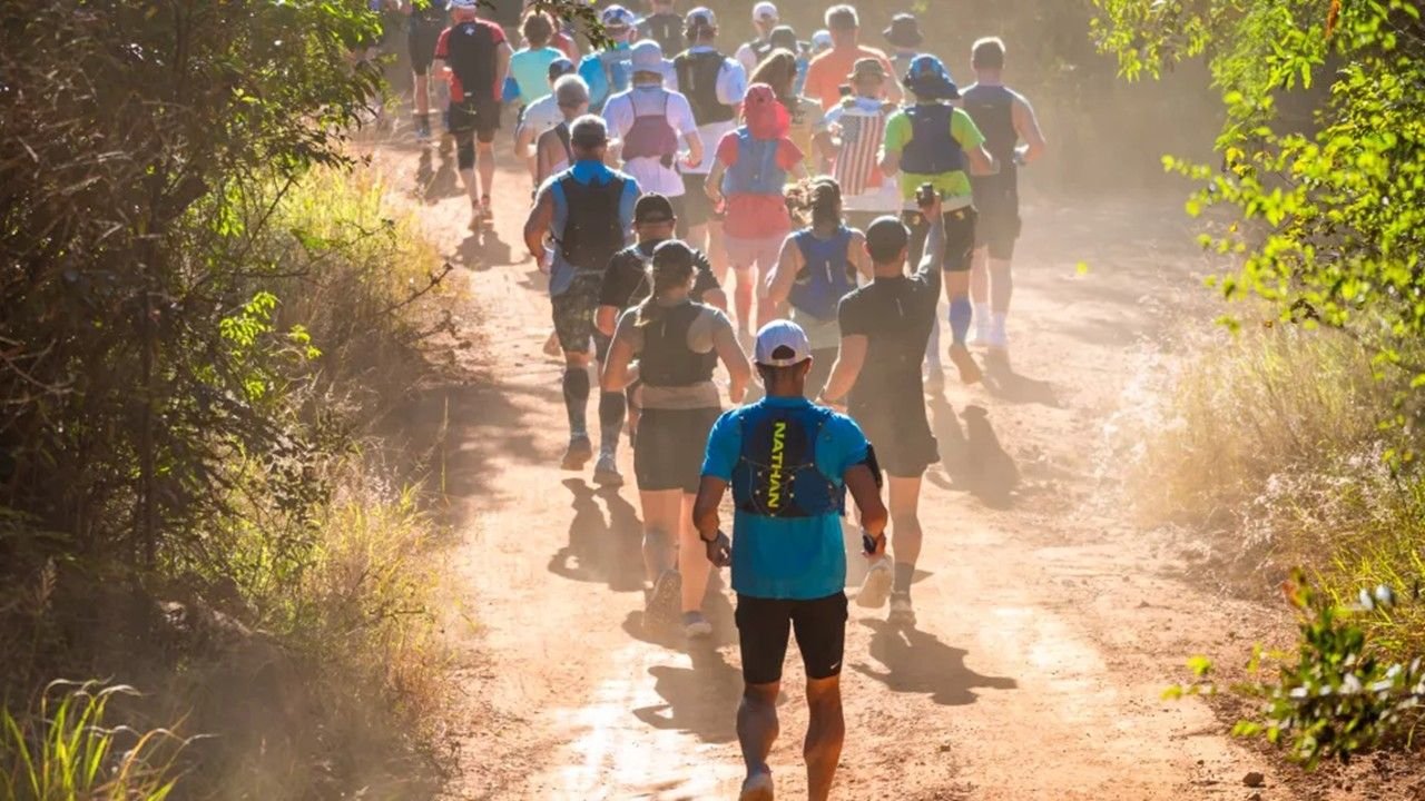 Runners on the Big Five Marathon course through the Entabeni Game Reserve in South Africa