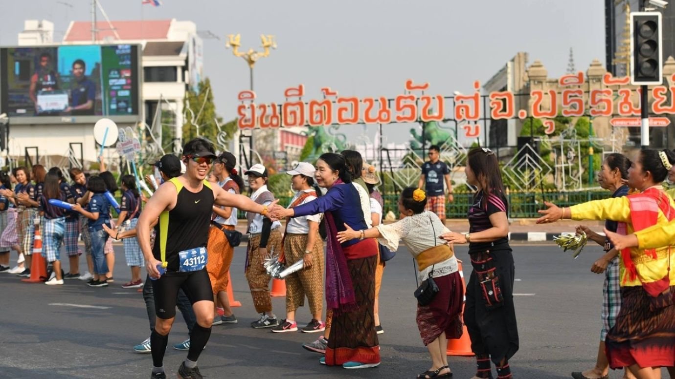 Runners competing at the Buriram Marathon in Buriram, Thailand, at the Chang International Circuit