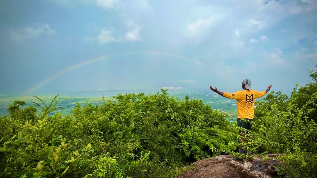 A runner navigating the trail course at Chennai Trail Ultra 2026 near the Sholavaram reservoir in Tamil Nadu