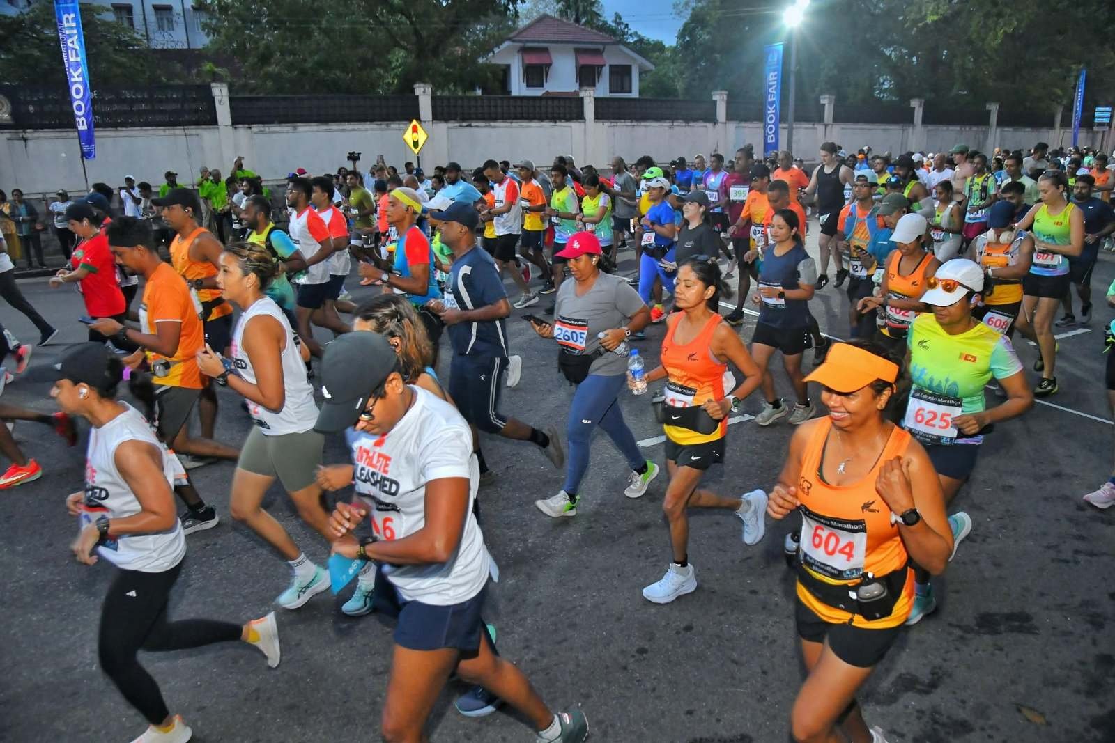 Crowd of runners participating in marathon