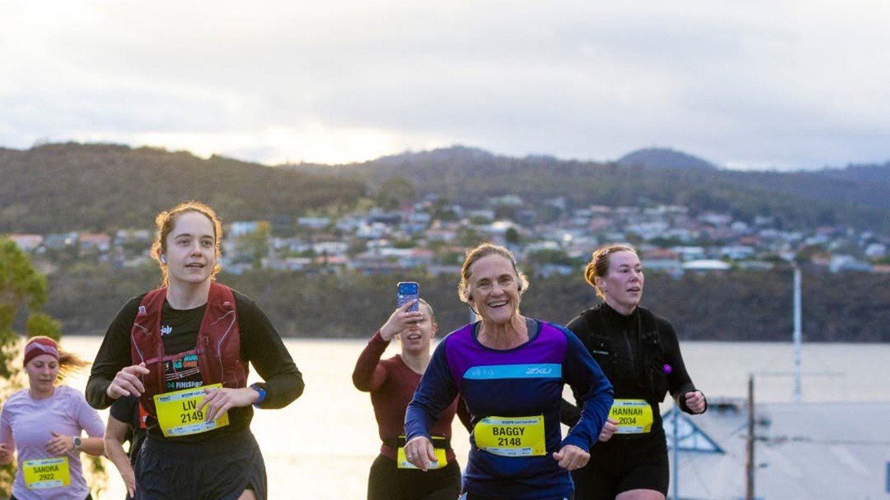 Runners along the Derwent River waterfront at the Hobart Marathon Festival, Tasmania
