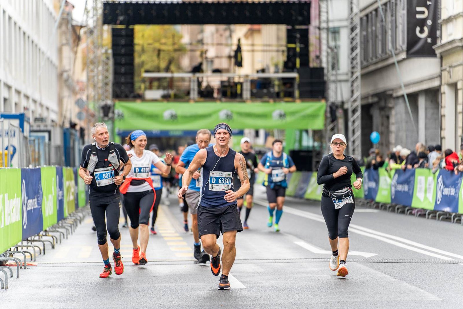Runners racing through Ljubljana city centre at the NLB 30th Ljubljana Marathon 2026