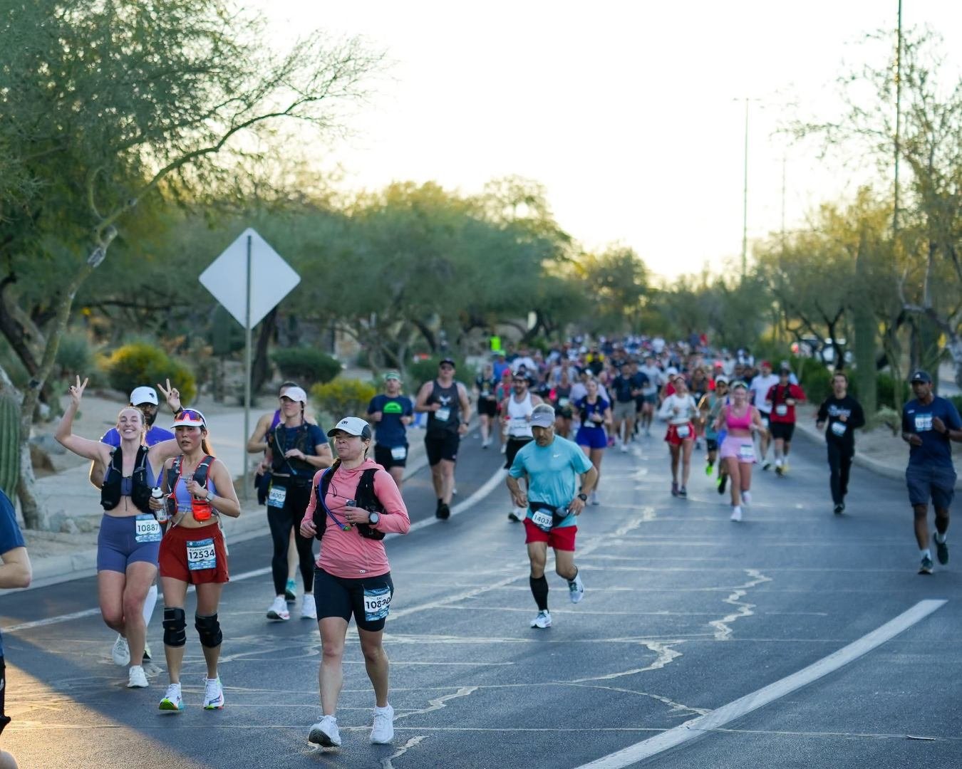 Runners racing through the streets of Mesa, Arizona during the annual Mesa Marathon