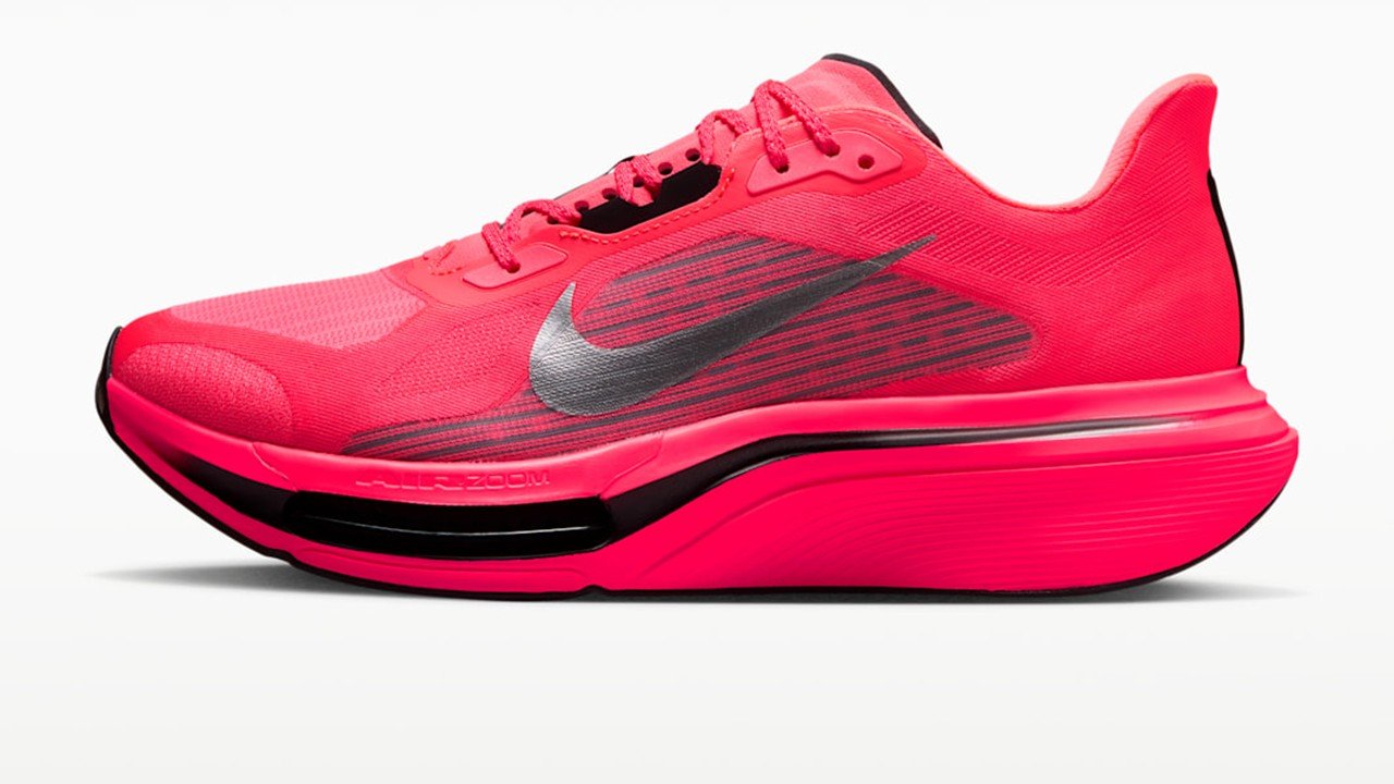 Nike Pegasus Plus 2 men's road running shoe in Flash Crimson colorway, showing the exposed curved Air Zoom forefoot unit and full-length ZoomX midsole
