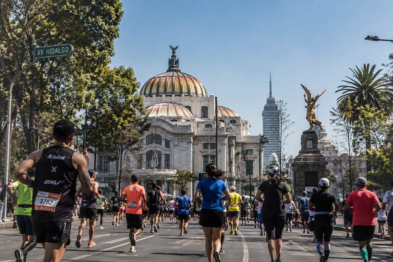 Runners racing through Mexico City streets during the Telcel Mexico City Marathon 2026