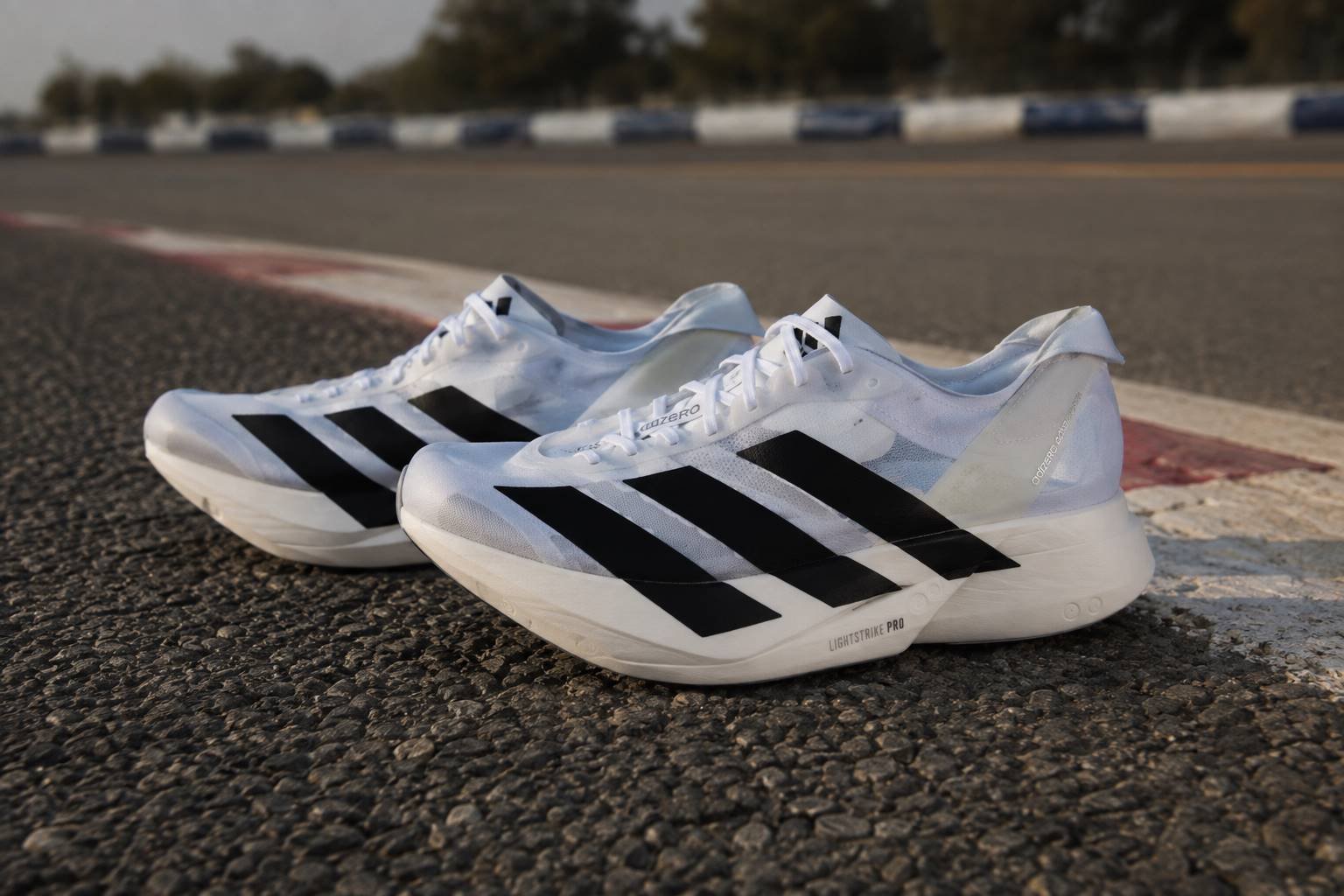 Illustrative image of the Adidas Adizero Adios Pro 5 racing shoe on a running track