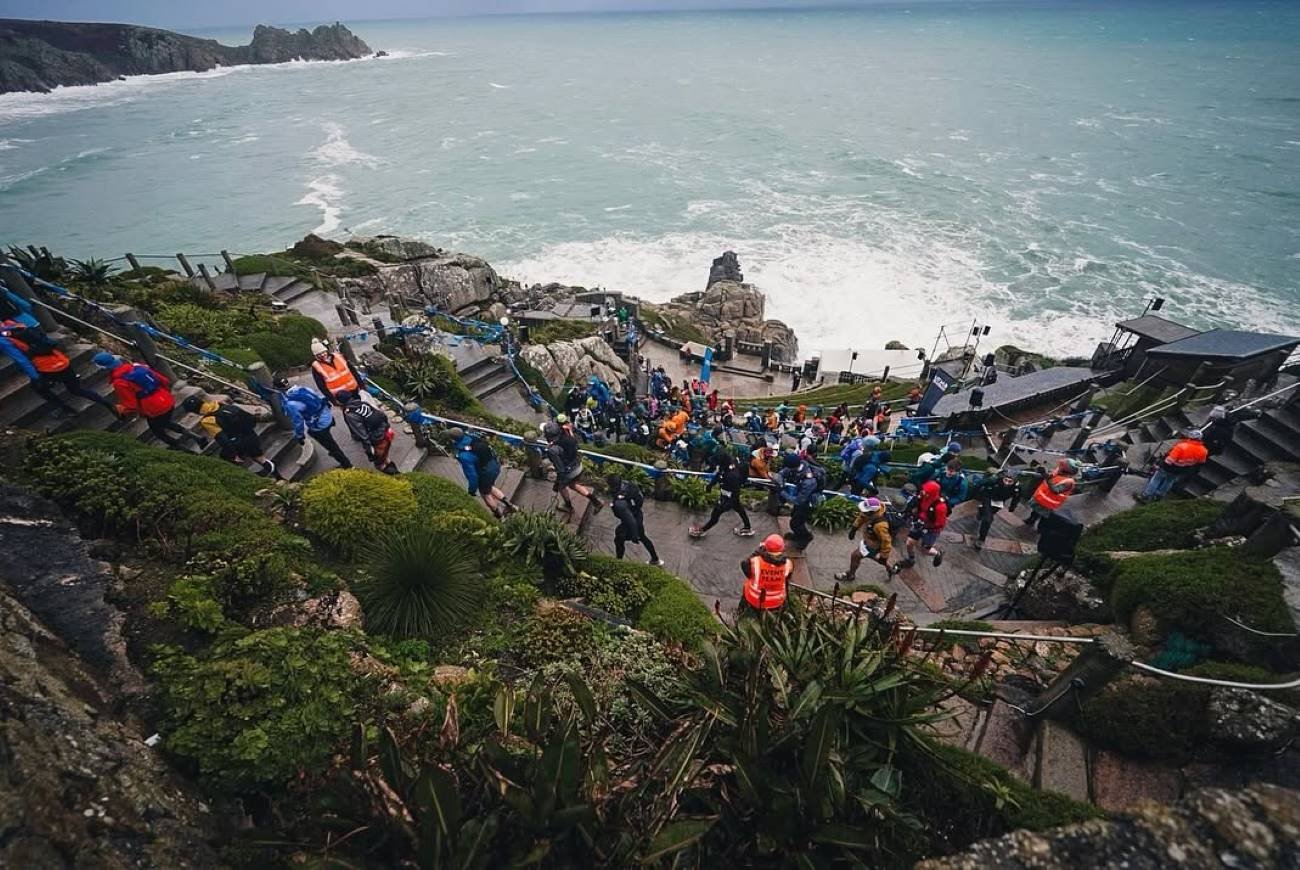 Runners on the South West Coast Path during Arc of Attrition by UTMB, Cornwall's iconic 173km winter coastal ultra