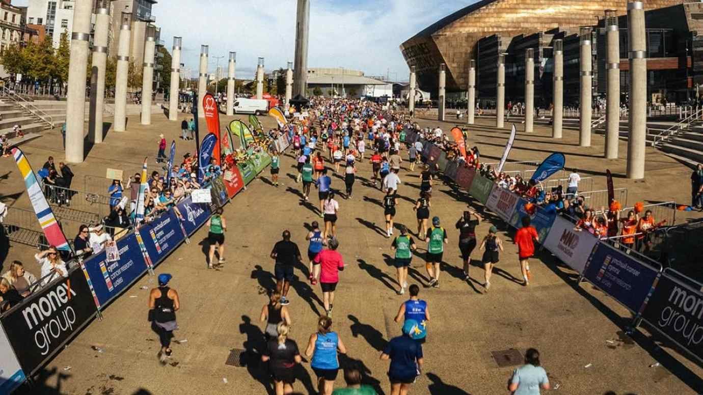Thousands of runners on the closed city streets of the Cardiff Half Marathon, passing through the Welsh capital