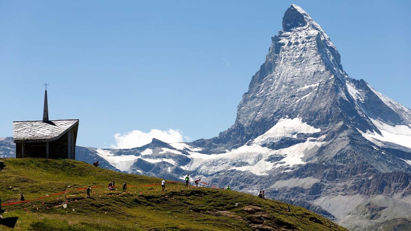 Runners on the Gornergrat-Zermatt Marathon course with the Matterhorn in the background above Riffelberg, Switzerland