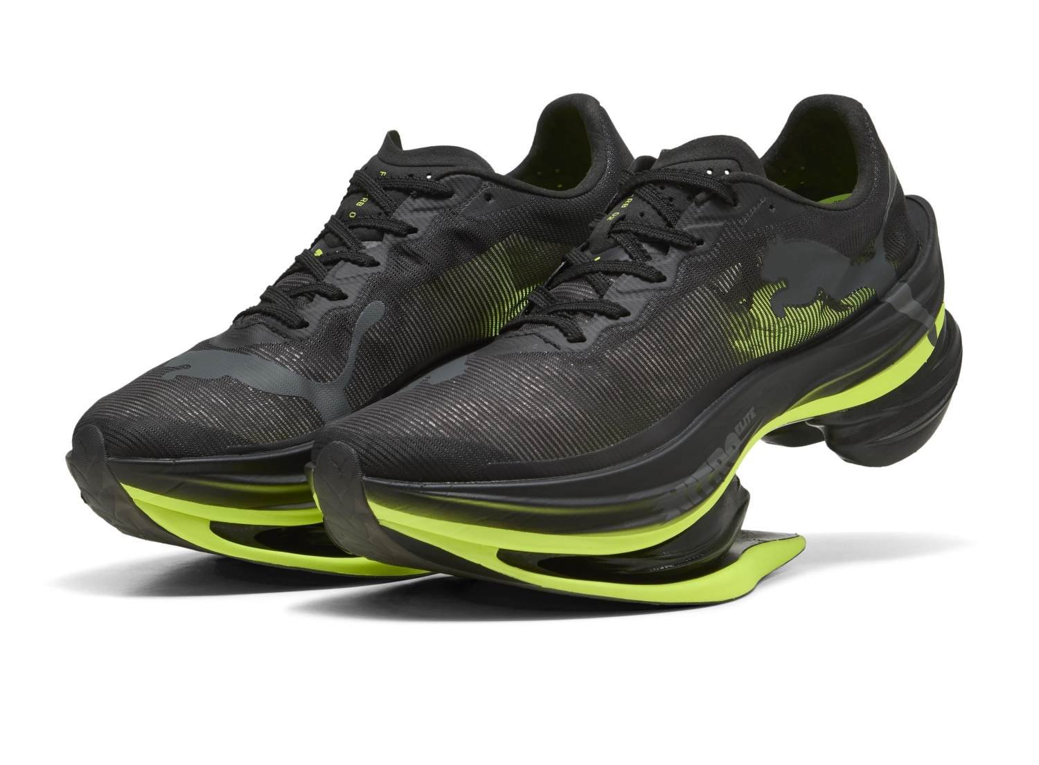 Puma Fast-RB Nitro Elite 2 running shoe showing dual fused carbon PWRPLATE springboard architecture in black colourway