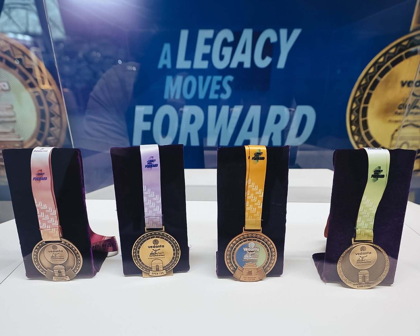 Four medals displayed on stands of VDHM 2026.